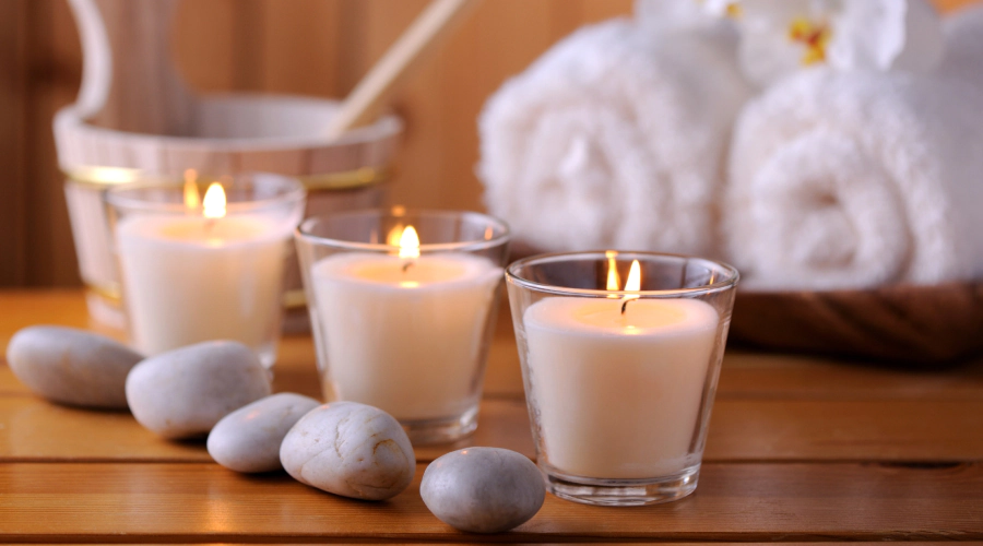 candles stones and towels